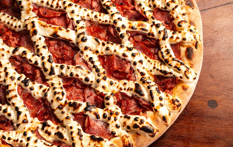 Freshly baked golden pizza crust